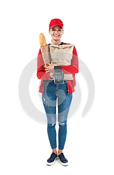 Delivery woman holding paper bag with food and payment terminal on white background