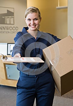 Delivery woman presenting shipping receipt