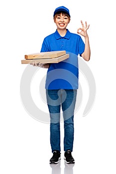 delivery woman with takeaway pizza boxes