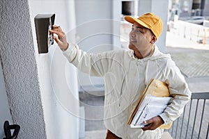 Delivery Worker Ringing Doorbell