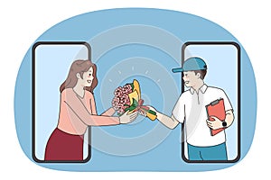 Deliveryman give flowers to woman through cell screen