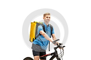 Deliveryman isolated on white studio background. Contacless delivery service during quarantine.