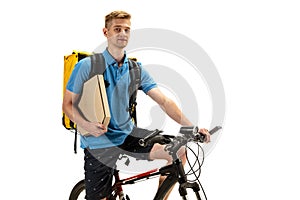 Deliveryman isolated on white studio background. Contacless delivery service during quarantine.