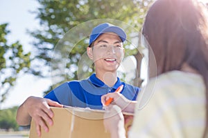 Deliveryman stand and smile