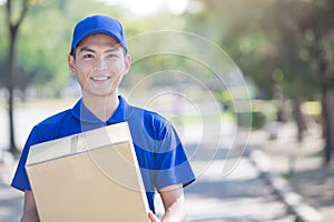 Deliveryman stand and smile photo