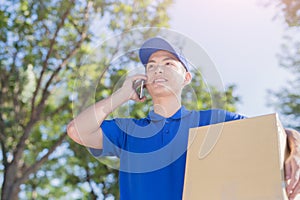 Deliveryman talk on phone