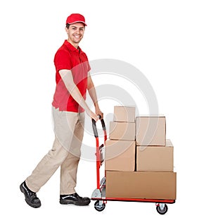 Deliveryman with a trolley of boxes photo