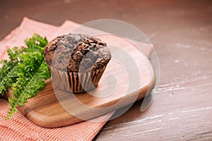 Dellicious homemade chocolate muffin on table. Ready to eat.