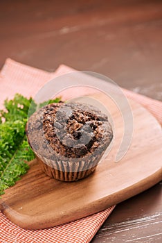 Dellicious homemade chocolate muffin on table. Ready to eat.