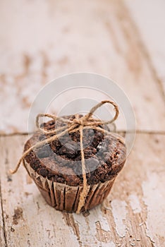 Dellicious homemade chocolate muffin on table. Ready to eat