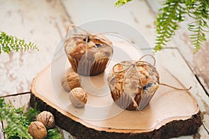 Dellicious homemade nut muffins on table. Sweet pastries