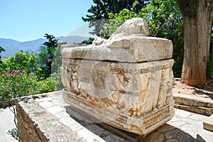 Delphi, ancient greek sarcophagus. Gravestone with a lying woman, Greece