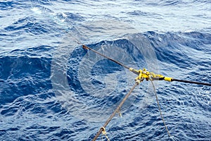 Delta plate of a tug boat towing a construction work barge