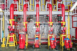 Deluge valve and fire water header to distribute high pressure water to risk area for firefighting.