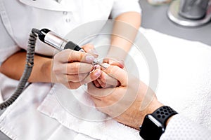 Deluxe manicure treatment, grooming of nail appearance