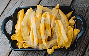 Deluxe serving of fries in a restaurant