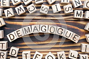 Demagogue wooden cubes with letters