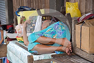 Demented sleeping Asian lady photo