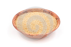 Demerara sugar in a wooden bowl