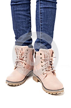 Demi-season, women`s shoes, pink, on the feet in jeans, white background, laces