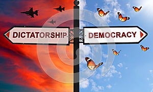 Democracy or Dictatorship choice on a signpost with arrows in two opposite directions