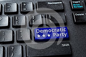 Democratic Party blue key on a decktop pc keyboard. United States elections and politics concepts. Voting online for Democratic photo