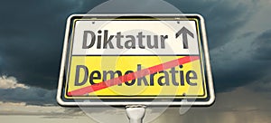German place-name sign with the German word `Demokratie` democracy and the German word `Diktatur` dictatorship photo
