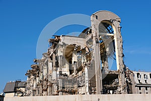 Demolished destructed building ruins.