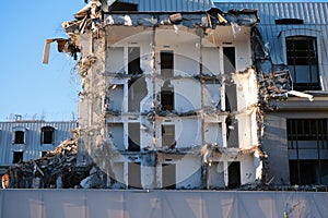 Demolished destructed building ruins.