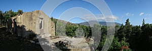 Demolished house near Monte Poro with the Monte Capanne mountain on the island Elba photo