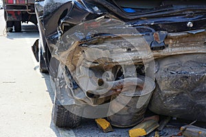 Demolished Rear Part of Dark Car after Accident