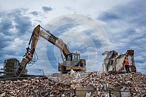 Demolishing old railway station building in Rogow, Poland