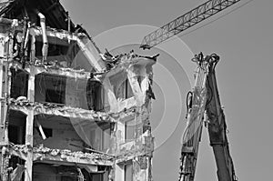 Demolition and bulldozer with crane