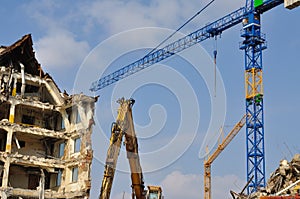 Demolition, cranes and bulldozer