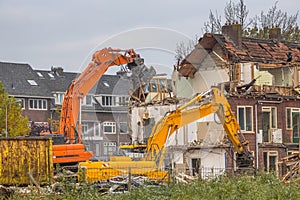 Demolition cranes at work