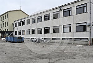 demolition of an old concrete school building