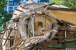 Demolition of old wooden house