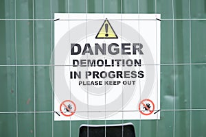 Demolition in progress keep out sign at construction building site