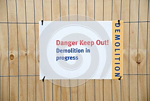 Demolition in progress keep out sign at construction building site