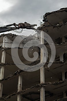 Demolition Pulveriser Demoliting Building in the City