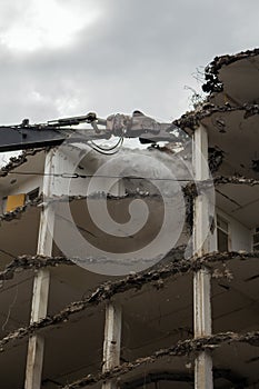 Demolition Pulveriser Demoliting Building in the City