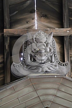 Demon figure on roof Ryoani, Zen-Temple, Kyoto, Japan