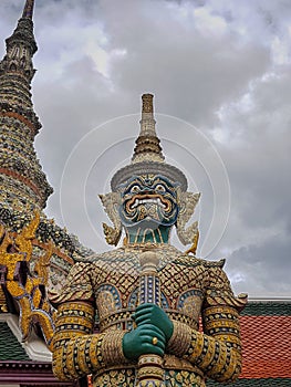 The demon statue as a spirit guard in grand palace Bangkok ,Thailand