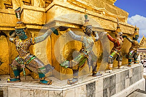 Demons mythical creatures guarding the Golden Stupa, Grand Palace, Thailand