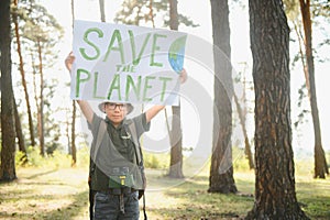 demonstration against global warming and pollution. Child boy making protest about climate change, plastic problems