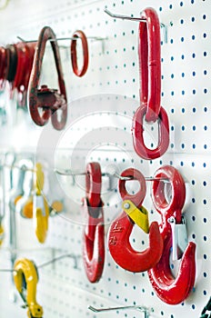 Demonstration booth with large red and yellow hooks