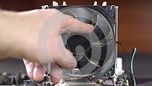 Demonstration of dust pollution. Dirty cooler and CPU heatsink from dust.