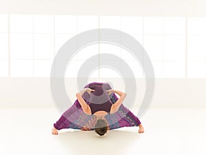 Demonstration of yoga pose indor