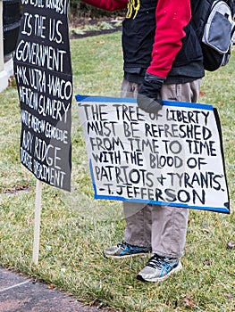 Anti-Government Sign at an Armed Demonstration at the Ohio Statehouse Ahead of Biden`s Inauguration