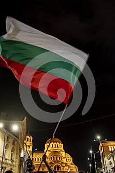 Demonstrators waving the Bulgarian flag during the 76-th day of anti-government protests against corrupt politicians